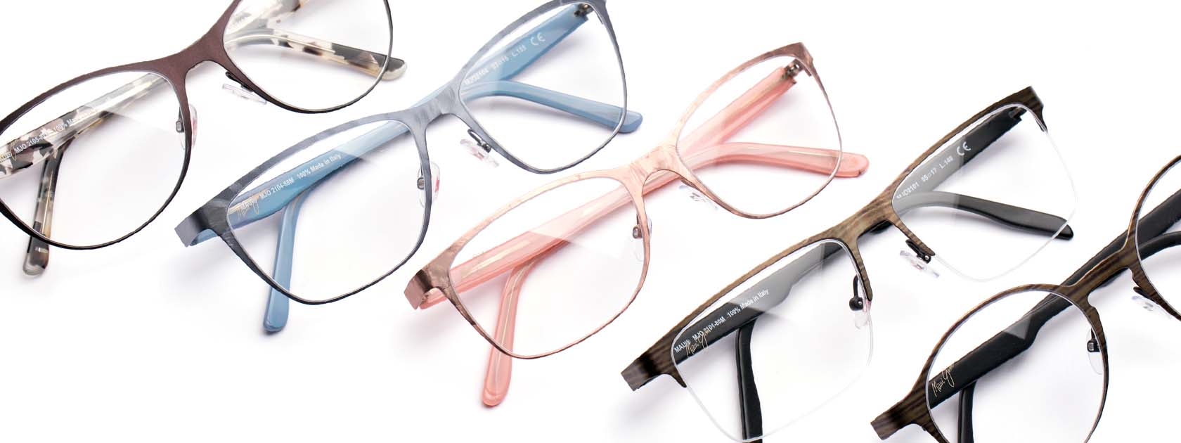 five pairs of ophthalmic glasses displayed over white background