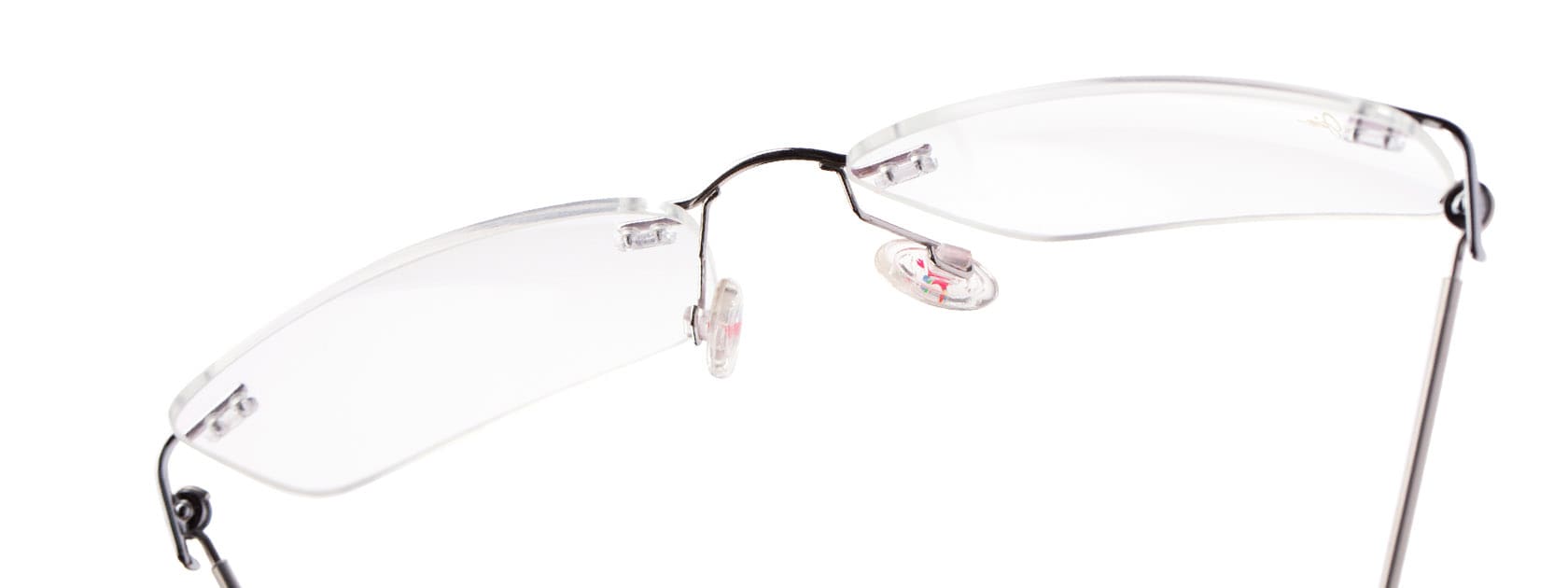 frameless ophthalmic glasses displayed over white background